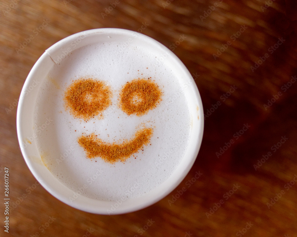 happy face take away coffe on wooden background, space for text happy face take away coffe on wooden background, space for text