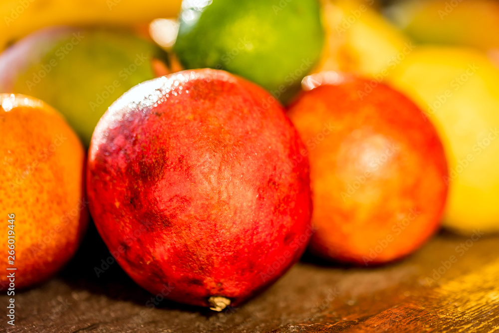 Studio shot of various exotic fruit on wood Studio shot of various exotic fruit on wood