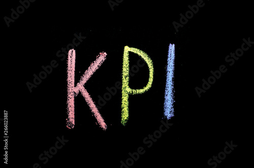 abbreviation "kpi" hand drawn on blackboard