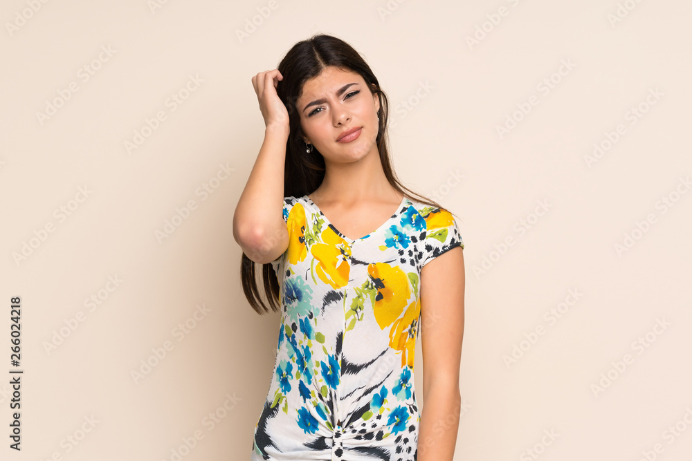 Teenager girl with floral dress having doubts Teenager girl with floral dress having doubts