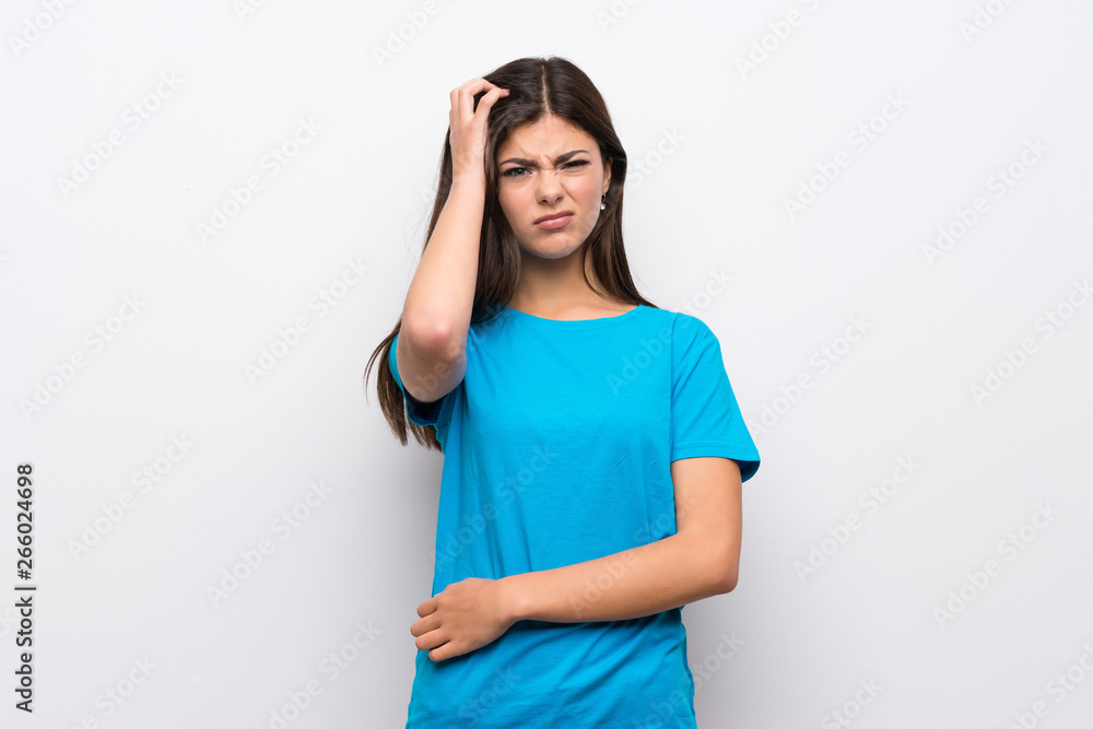 Teenager girl with blue shirt having doubts Teenager girl with blue shirt having doubts