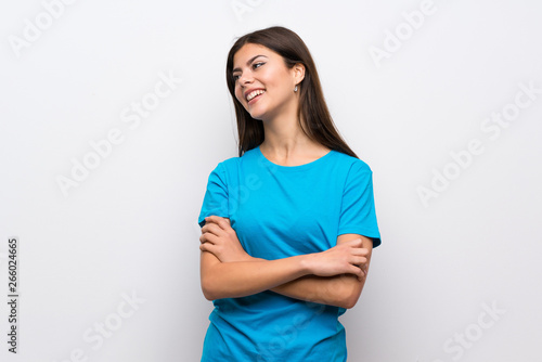 Teenager girl with blue shirt happy and smiling
