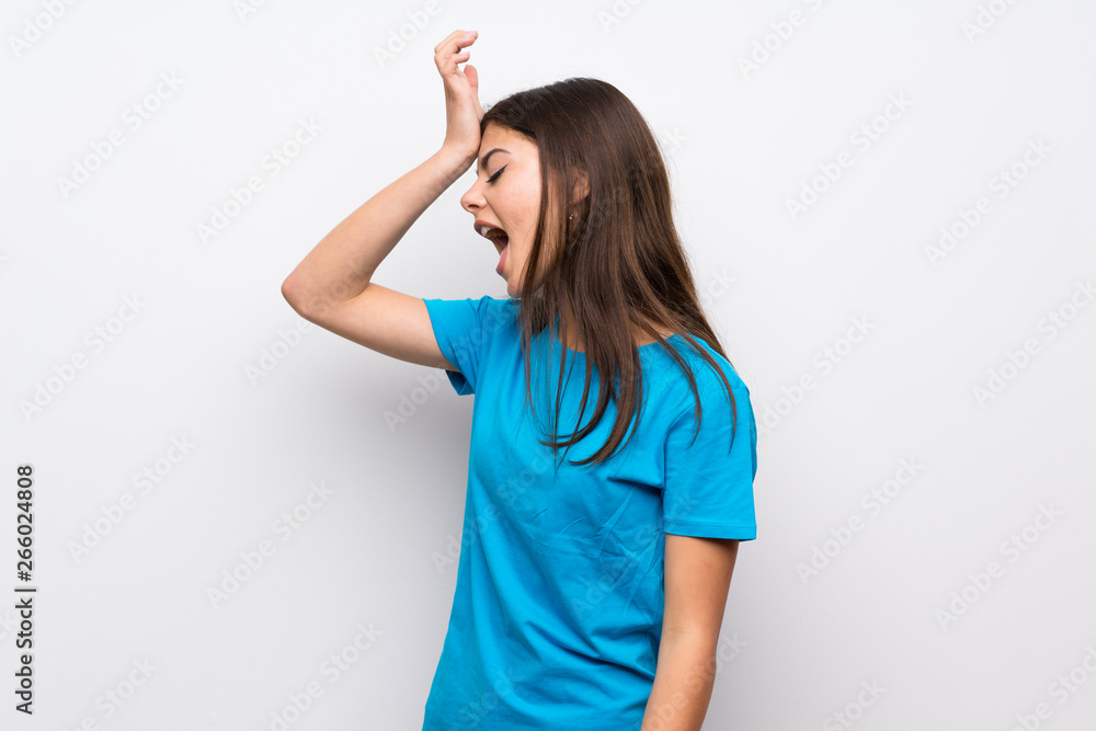 Teenager girl with blue shirt has realized something and intending the solution Teenager girl with blue shirt has realized something and intending the solution
