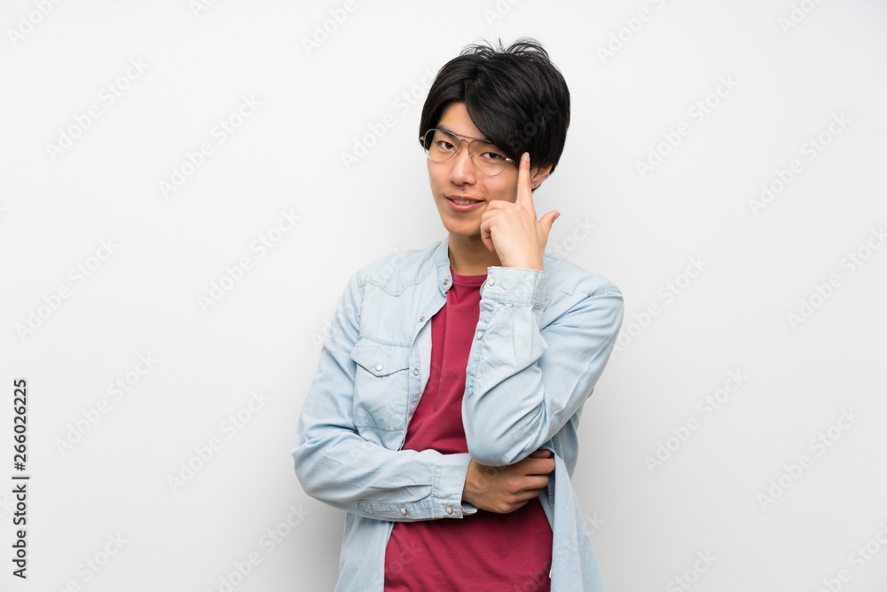 Asian man on isolated white background with glasses and happy Asian man on isolated white background with glasses and happy
