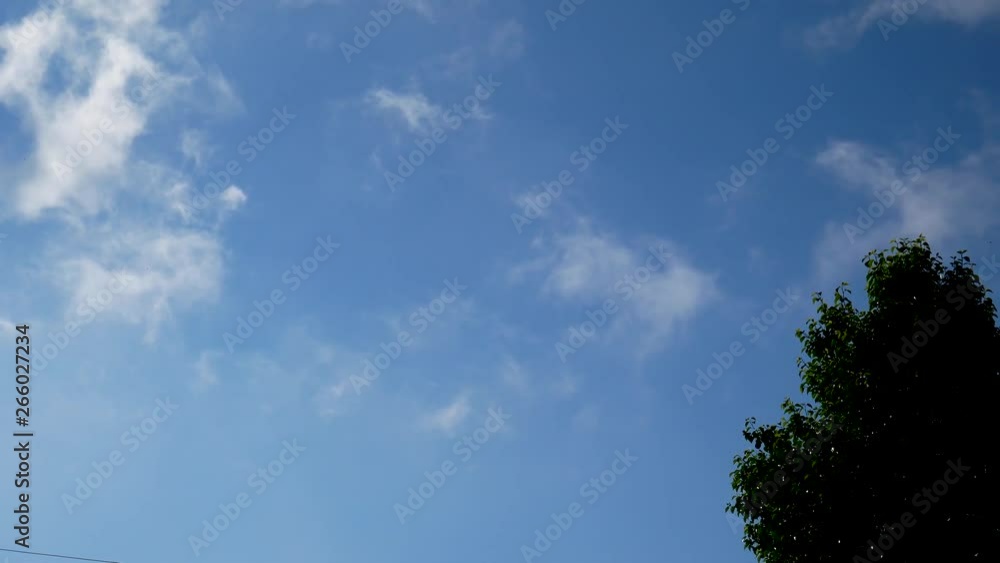 Clouds rolling by on a sunny day Clouds rolling by on a sunny day