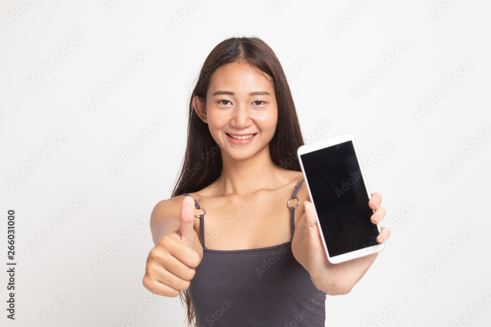 Young Asian woman show thumb up with mobile phone. Young Asian woman show thumb up with mobile phone.
