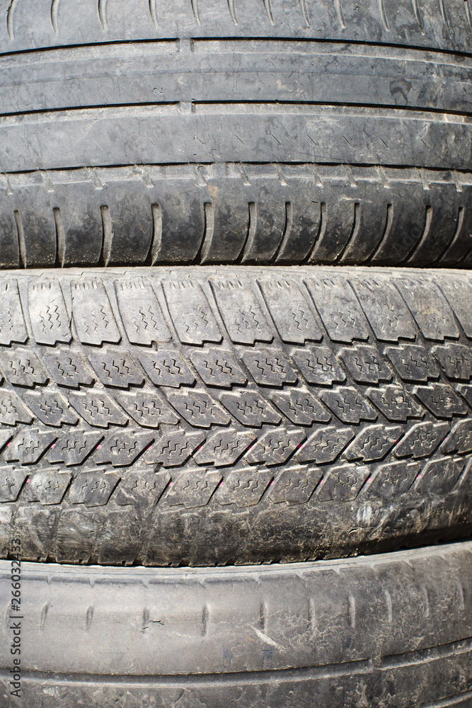 Car old used tires close up. Pile of used tires