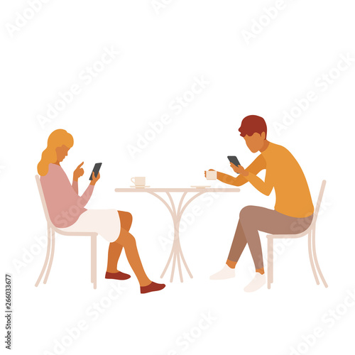 Young couple or friends distracted by their smartphones on a date