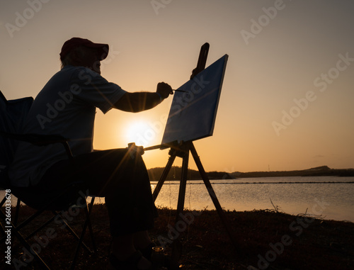  Artists paint at sunset  Views arund the small caribbean Island of Curacao © Gail Johnson