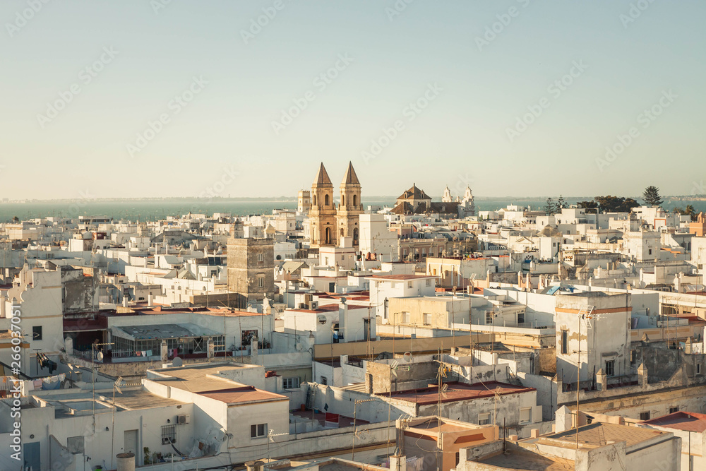 PANORAMIC OF THE CITY OF CADIZ IN SPAIN WITH CHURCH TOWERS AND SEA HORIZON