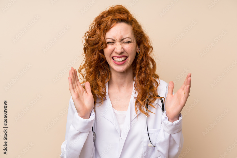 Redhead doctor woman laughing Redhead doctor woman laughing