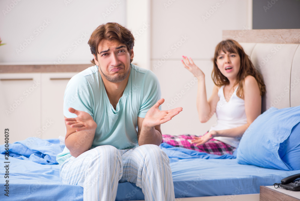 Young couple in the bedroom Young couple in the bedroom