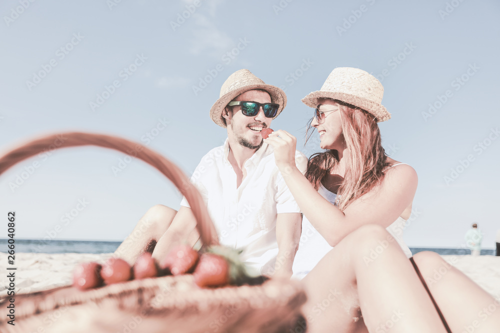 Lovers on beach and free space for your decoration. 