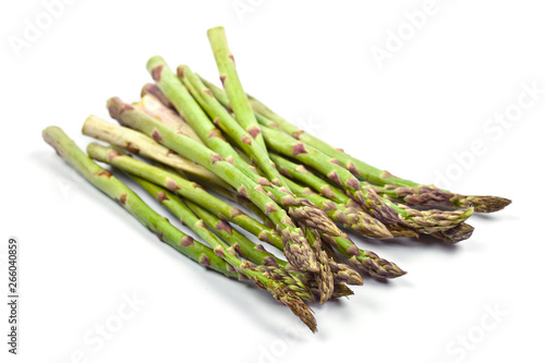 Bunch of fresh raw garden asparagus isolated on white background. Green spring vegetables.