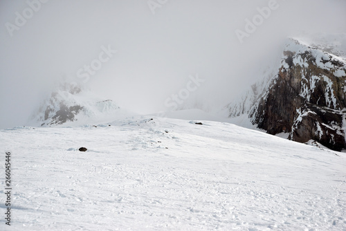 Snow covered terrain on Mount Hood, a volcano in the Cascade Mountains in Oregon popular for hiking, climbing, snowboarding and skiing, despite risks of avalanche, crevasses and weather on the peak.
