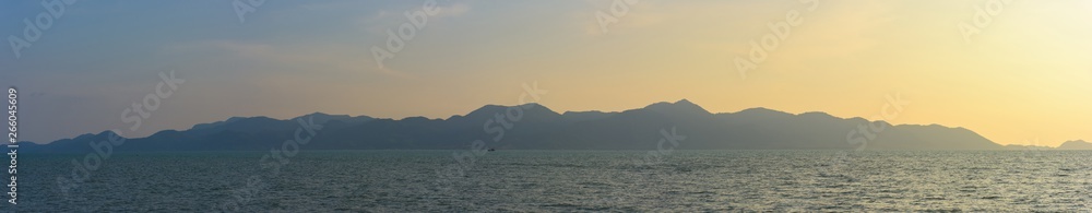 Panoramic beautiful seascape and island with cloud in sunset.