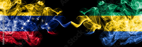 Venezuela vs Gabon  Gabonese smoky mystic flags placed side by side. Thick colored silky smoke flags of Venezuela and Gabon  Gabonese