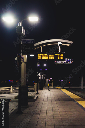 Trolley station at night, San Diego California with signs