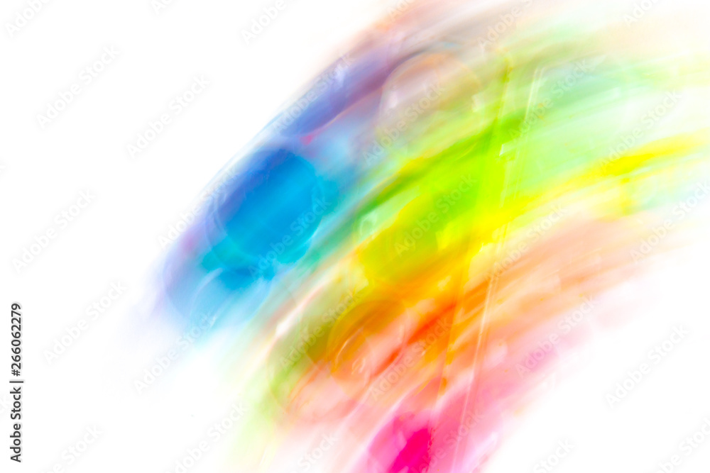 Original creative background. Blurred bright colors in motion.