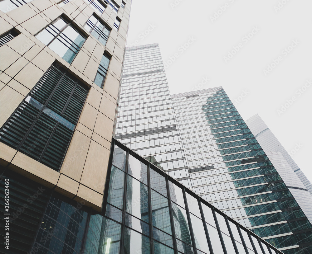 Fragment of the facade of a skyscraper in Moscow. Beautiful perspective of straight lines