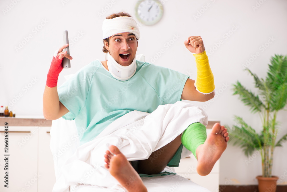 Young injured man staying in the hospital Young injured man staying in the hospital