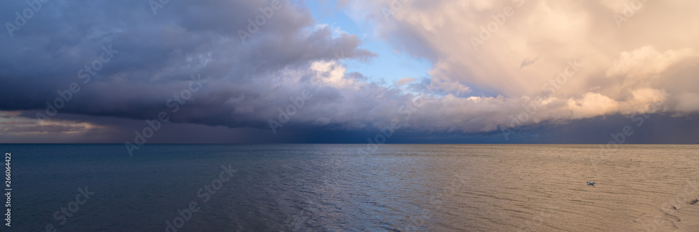 Dramatic colourful cloud formation over the Baltic Sea during sunset, Usedom, Germany