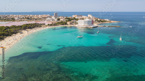 Fototapeta Naklejka Na Ścianę i Meble -  Colonia Sant Jordi, Mallorca Spain. Amazing drone aerial landscape of the charming Estanys beach and the boats with a turquoise Caribbean sea