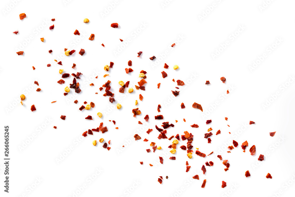 Chilli Flakes Scattered over White Background Top View