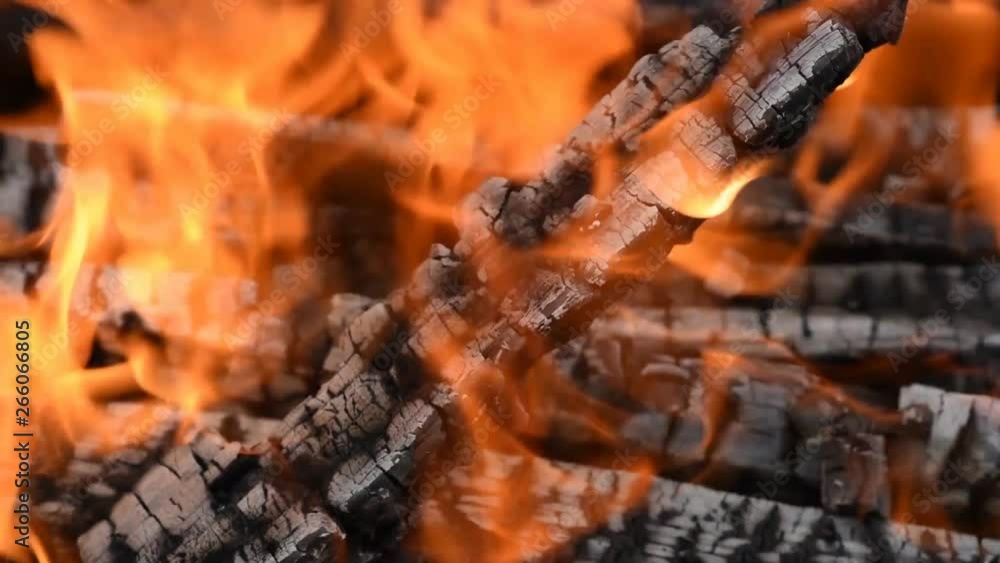 the flames in the campfire coals hot and the smoke the flames in the campfire coals hot and the smoke