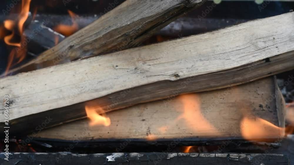 the flames in the campfire coals hot and the smoke the flames in the campfire coals hot and the smoke