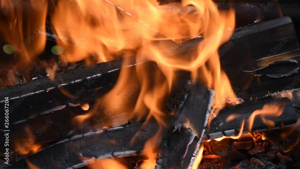 the flames in the campfire coals hot and the smoke the flames in the campfire coals hot and the smoke