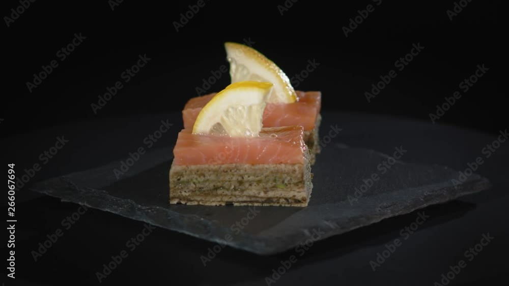 Snack Appetizer with Smoked Salmon Avocado & Lemon Loop Avocado & Lemon The concept of a healthy diet and healthy lifestyle. sandwiches with avocado and salmon from the Chef Snack Appetizer with Smoked Salmon Avocado & Lemon Loop Avocado & Lemon The concept of a healthy diet and healthy lifestyle. sandwiches with avocado and salmon from the Chef