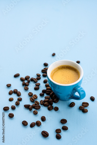Blue espresso cup on blue