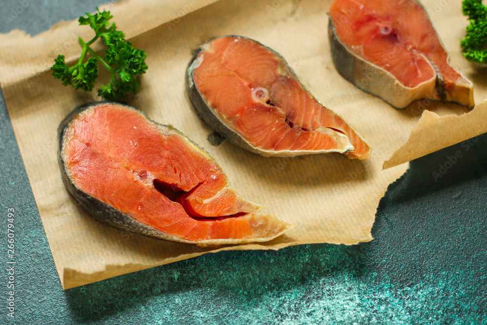 salmon, red fish piece raw fillet (fresh seafood). food background. top salmon, red fish piece raw fillet (fresh seafood). food background. top