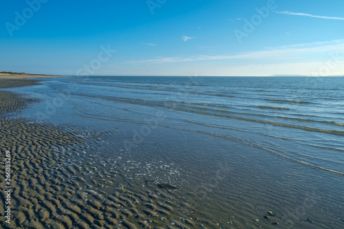 The Calm Sea Meets the Rippled Sand  West Wittering  UK