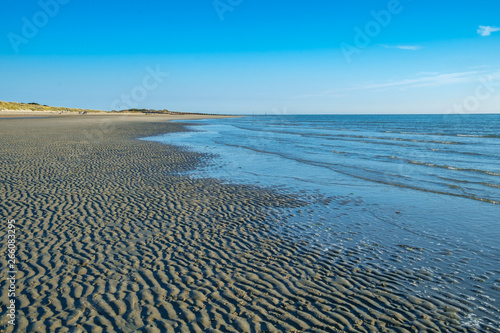The Calm Sea Meets the Rippled Sand  West Wittering  UK
