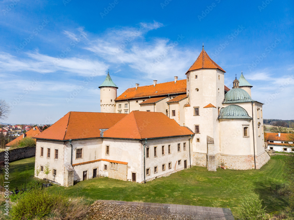 Renaissance Castle on the hill in Nowy Wiśnicz, Poland, aerial drone view.