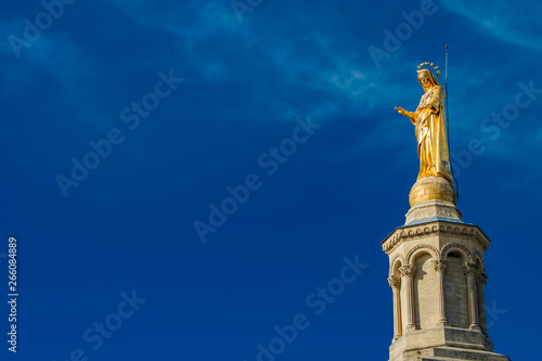 Gilded statue of Virgin Mary at Notre-Dame des Doms cathedral in Avignon  France