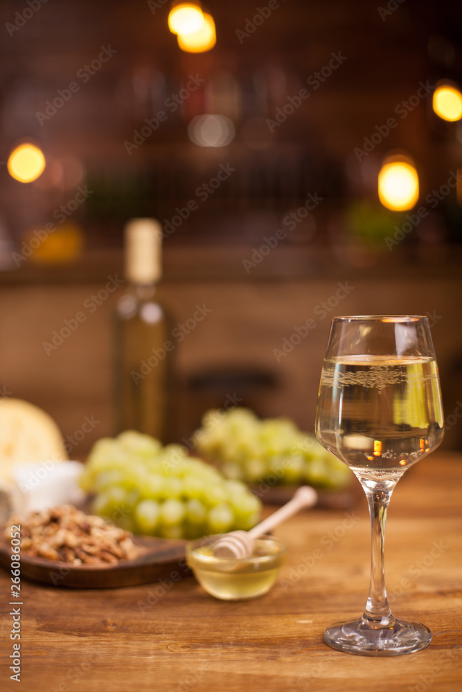 Wine tasting in a vintage restaurant with gorgonzola on a rustic wooden table