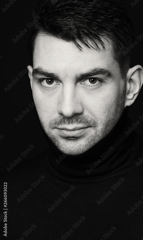 Black and white photo of a handsome man face Black and white photo of a handsome man face