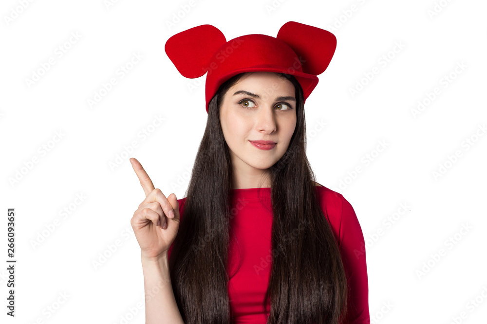 White black haired beautiful young woman with mouse ears hat and rised index finger White black haired beautiful young woman with mouse ears hat and rised index finger
