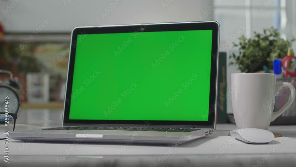 Laptop Green Screen, Home office, Dolly shot. Chroma Key laptop. Stock Video Adobe Stock