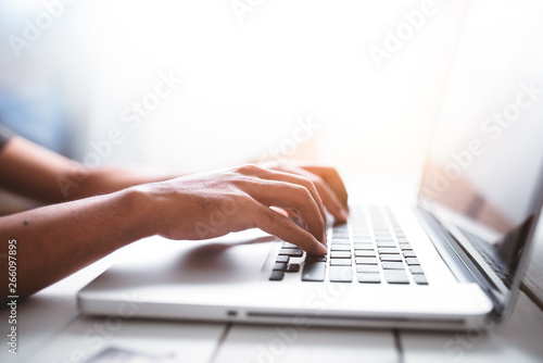 Business man using laptop computer.