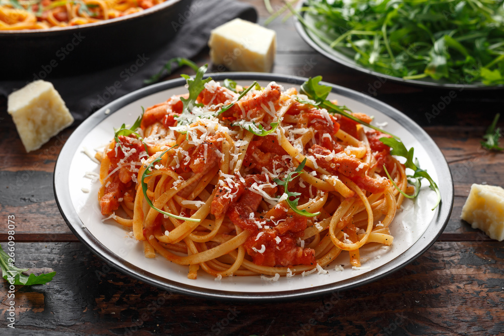 Spaghetti alla Amatriciana with pancetta bacon, tomatoes and pecorino cheese Spaghetti alla Amatriciana with pancetta bacon, tomatoes and pecorino cheese