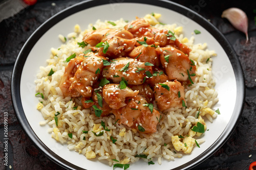 Orange Chicken Spicy sweet and sour with fried eggs rice photo