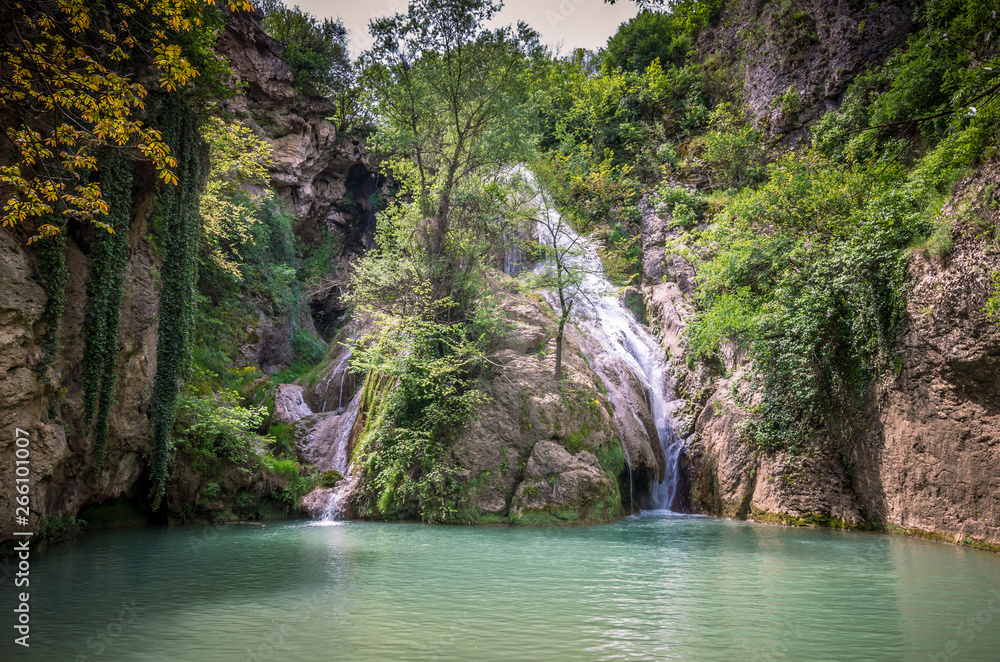 Kaya Bunar Waterfall, Bulgaria. It is located in Hotnitsa Canyon on Bohot river Kaya Bunar Waterfall, Bulgaria. It is located in Hotnitsa Canyon on Bohot river