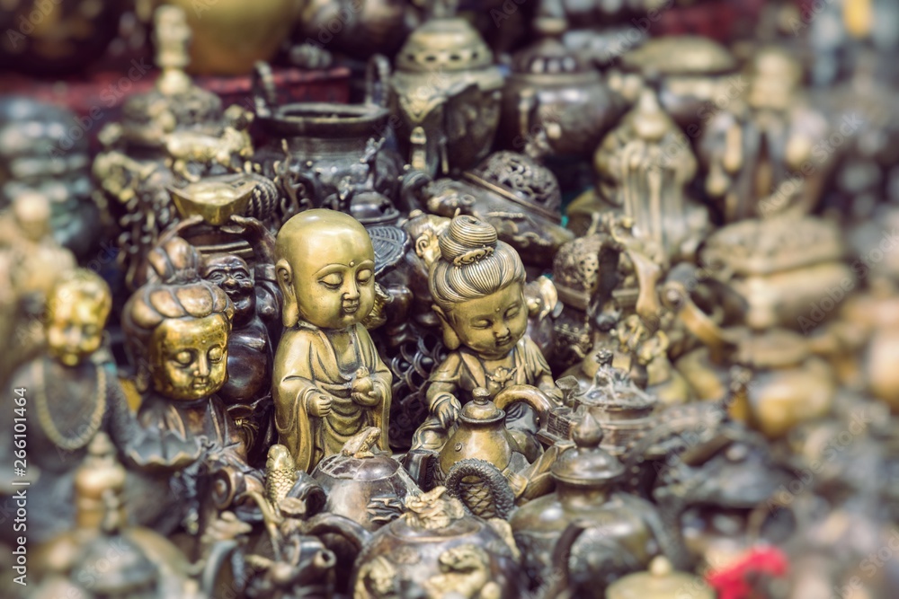 Fototapeta premium Colorful souvenirs for sale on the street in a shop in Morocco.