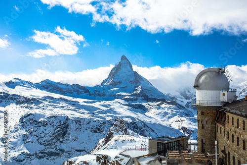 The Matterhorn is a pyramidal shaped mountain of the Swiss Alps, standing at the border between Switzerland and Italy. The mountain is one of the highest peaks in the Alps and Europe. photo