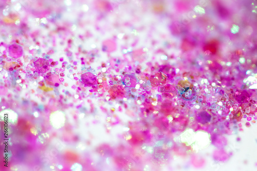 Pink Sparkling Glitter on White Background Bokeh Abstract Close Up photo