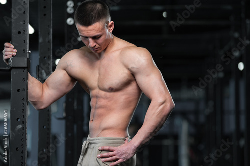 Athletic Shirtless Man Showing Well Trained Body and Abdominal Muscles.